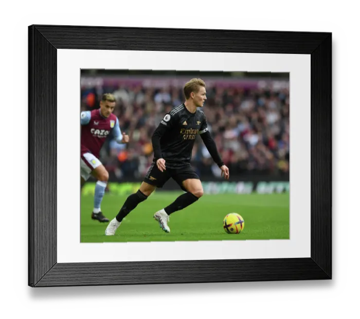 Framed Print : Martin Odegaard's Midfield Magic: Arsenal's Victory at Aston Villa, Premier League 2022-23