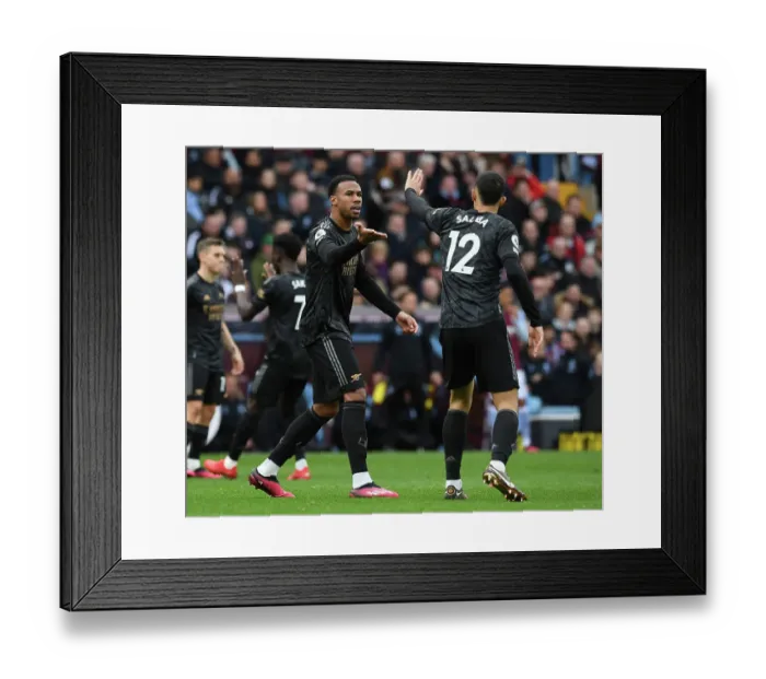 Framed Print : Arsenal's Magalhaes and Saliba in Action: Aston Villa vs Arsenal, Premier League 2022-23