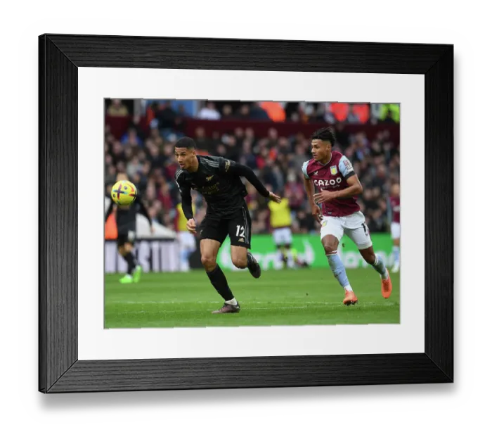 Framed Print : Saliba Chased Down by Watkins: Aston Villa vs. Arsenal, Premier League 2022-23