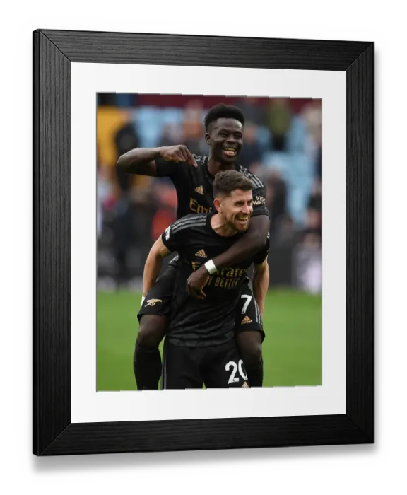 Framed Print : Arsenal's Saka and Jorginho Celebrate Victory over Aston Villa in Premier League Clash (2022-23) Framed Print : Arsenal's Saka and Jorginho Celebrate Victory over Aston Villa in Premier League Clash (2022-23)