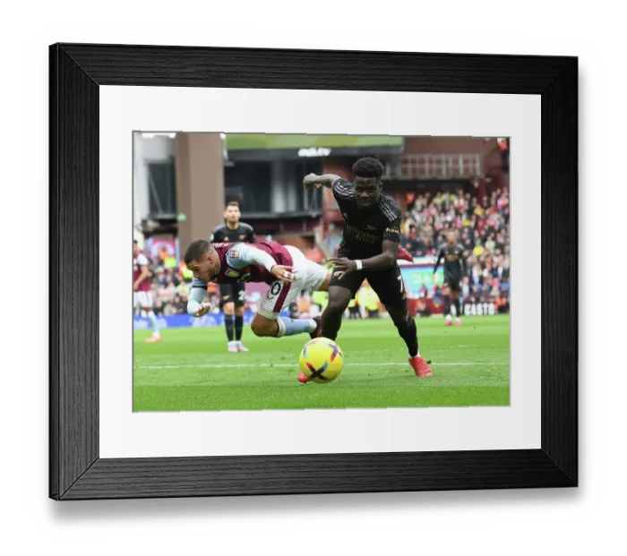 Framed Print : Saka vs Buendia: A Premier League Battle at Villa Park