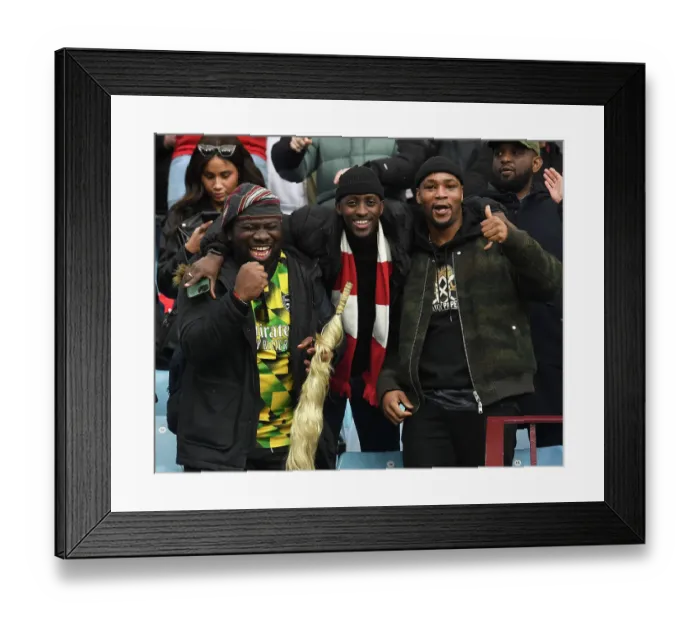 Framed Print : Arsenal Fans Celebrate Victory over Aston Villa in Premier League Match Framed Print : Arsenal Fans Celebrate Victory over Aston Villa in Premier League Match
