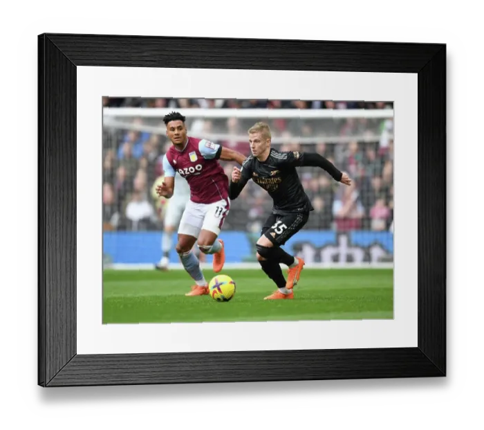 Framed Print : Arsenal's Zinchenko Outmaneuvers Villa's Watkins in Premier League Clash
