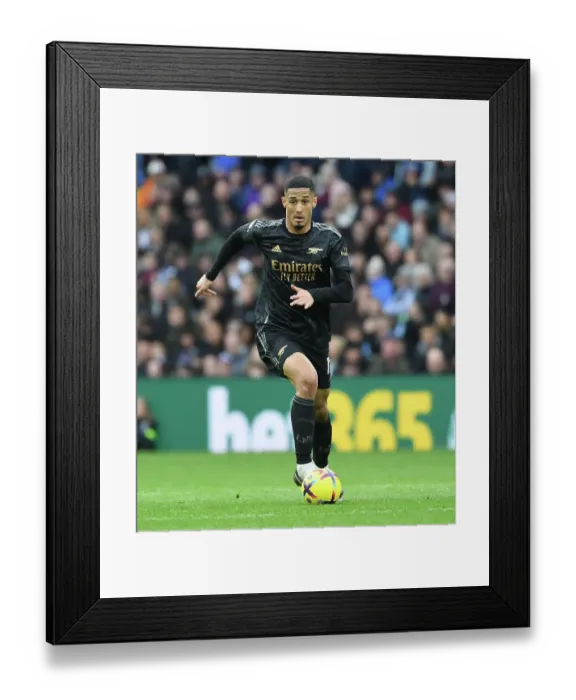 Framed Print : William Saliba's Premier League Debut: Arsenal vs. Aston Villa, 2022-23 - Arsenal's Young Defender Shines at Villa Park