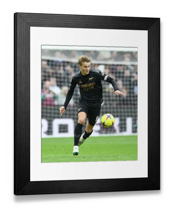 Framed Print : Martin Odegaard's Brilliant Midfield Display: Arsenal Secures Victory Over Aston Villa in the 2022-23 Premier League Framed Print : Martin Odegaard's Brilliant Midfield Display: Arsenal Secures Victory Over Aston Villa in the 2022-23 Premier League