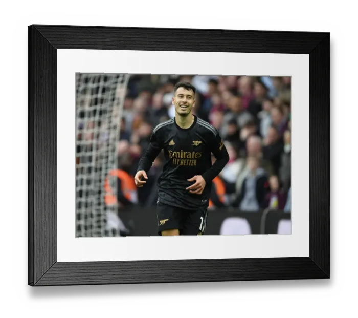 Framed Print : Martinelli's Brace: Arsenal Crush Aston Villa 4-0 in Premier League