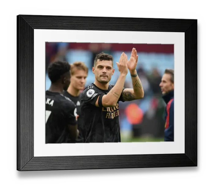 Framed Print : Granit Xhaka's Heartfelt Applause: Aston Villa vs. Arsenal FC, Premier League 2022-23