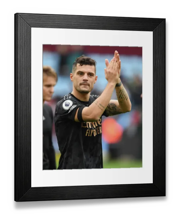 Framed Print : Granit Xhaka's Emotional Applause: Aston Villa vs. Arsenal FC, Premier League 2022-23 - A Heartfelt Moment at Villa Park