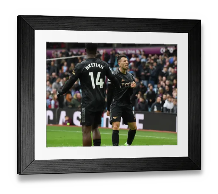 Framed Print : Martinelli and Nketiah Celebrate Arsenal's Four-Goal Lead Over Aston Villa (2022-23)