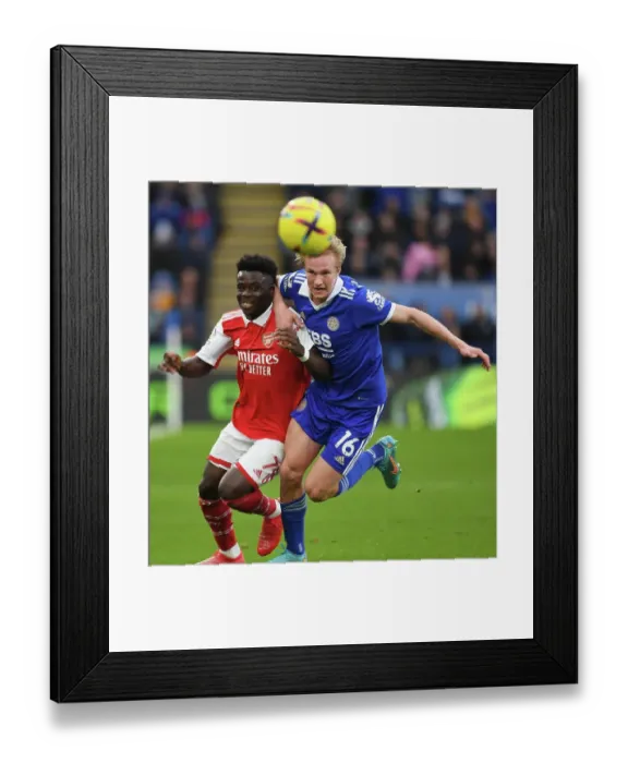 Framed Print : Bukayo Saka vs. Victor Kristiansen: Leicester City vs. Arsenal FC, Premier League Clash (February 2023)