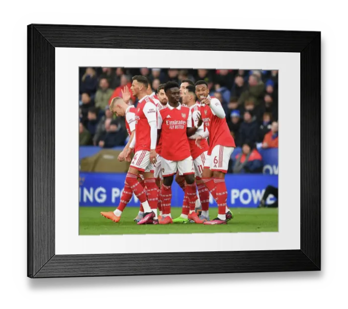 Framed Print : Arsenal's Saka and Gabriel Face Off Against Leicester City in Premier League Clash