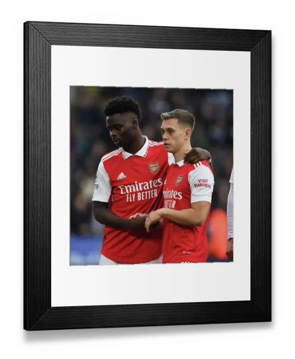 Framed Print : Arsenal's Bukayo Saka and Leandro Trossard Clash With Leicester City in Premier League Showdown