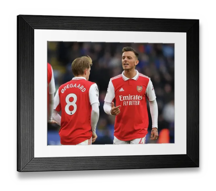 Framed Print : Arsenal's Odegaard and White in Action: Leicester City vs Arsenal, Premier League 2022-23