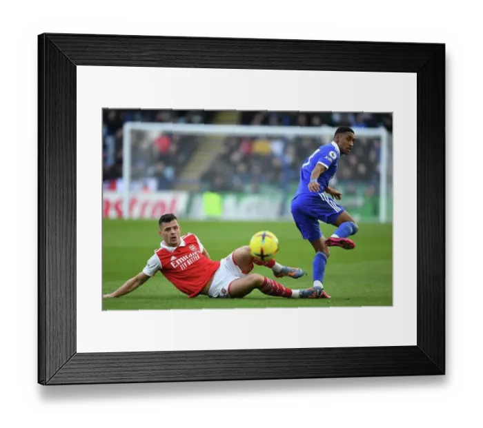 Framed Print : Granit Xhaka Tackles Tete: Leicester City vs Arsenal FC, Premier League 2022-23 Framed Print : Granit Xhaka Tackles Tete: Leicester City vs Arsenal FC, Premier League 2022-23