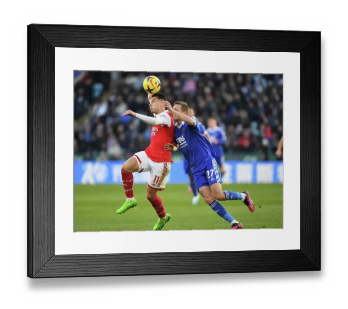 Framed Print : Gabriel Martinelli Breaks Past Timothy Castagne: Leicester City vs. Arsenal FC, Premier League 2022-23