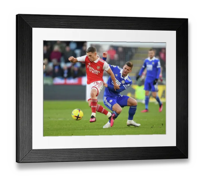 Framed Print : Intense Rivalry: Trossard vs. Praet Battle - Leicester City vs. Arsenal FC: A Fight for Supremacy in the Premier League