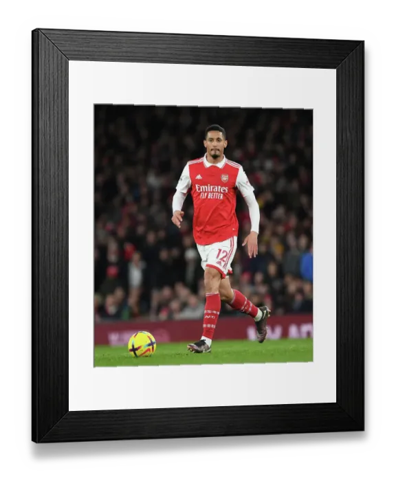 Framed Print : Arsenal's William Saliba Faces Off Against Everton in Premier League Showdown Framed Print : Arsenal's William Saliba Faces Off Against Everton in Premier League Showdown