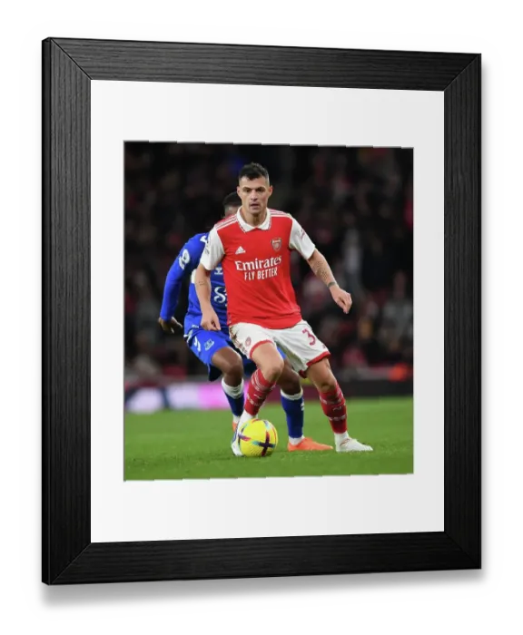 Framed Print : Granit Xhaka: Arsenal's Midfield Maestro in Action Against Everton, Premier League 2022-23 Framed Print : Granit Xhaka: Arsenal's Midfield Maestro in Action Against Everton, Premier League 2022-23
