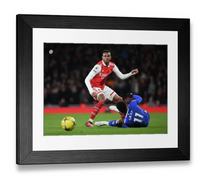 Framed Print : Arsenal vs. Everton: Gabriel Faces Off Against Demarai Gray in Premier League Showdown