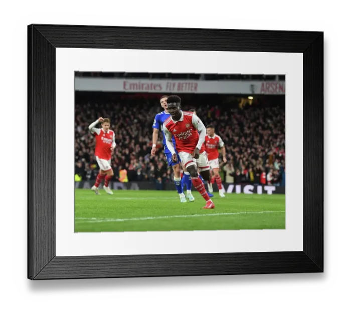 Framed Print : Saka Scores First: Arsenal's Victory Over Everton in the Premier League