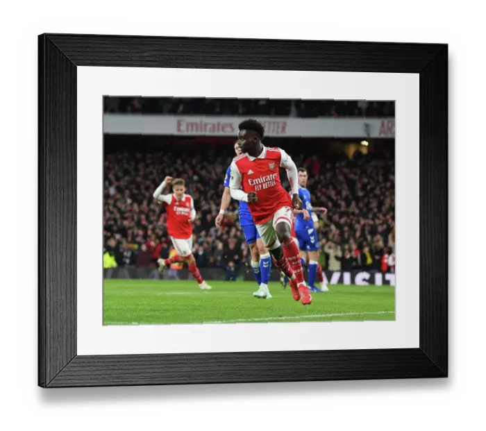 Framed Print : Saka Scores First: Arsenal's Victory over Everton in the Premier League