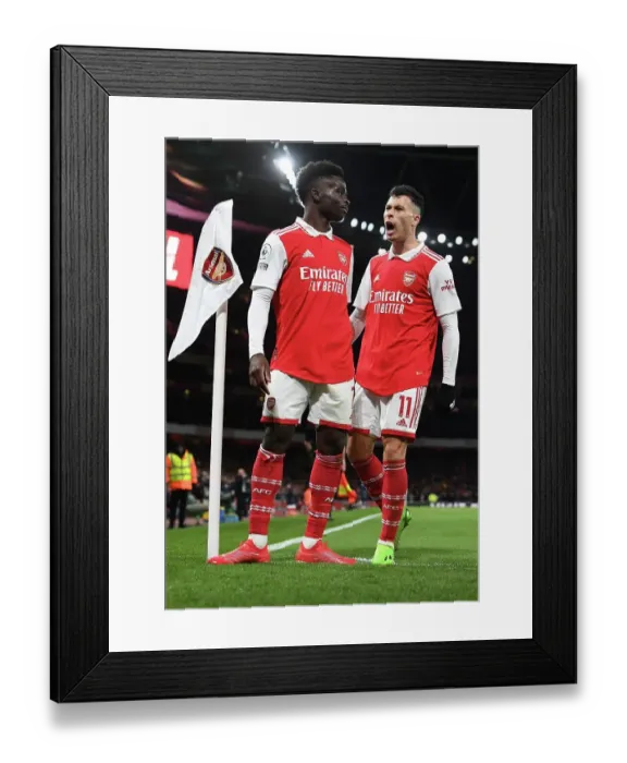 Framed Print : Saka and Martinelli Celebrate First Arsenal Goal Against Everton in 2022-23 Premier League