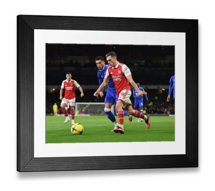Framed Print : Arsenal's Trossard Outsmarts Everton's Godfrey: Thrilling Premier League Showdown Framed Print : Arsenal's Trossard Outsmarts Everton's Godfrey: Thrilling Premier League Showdown