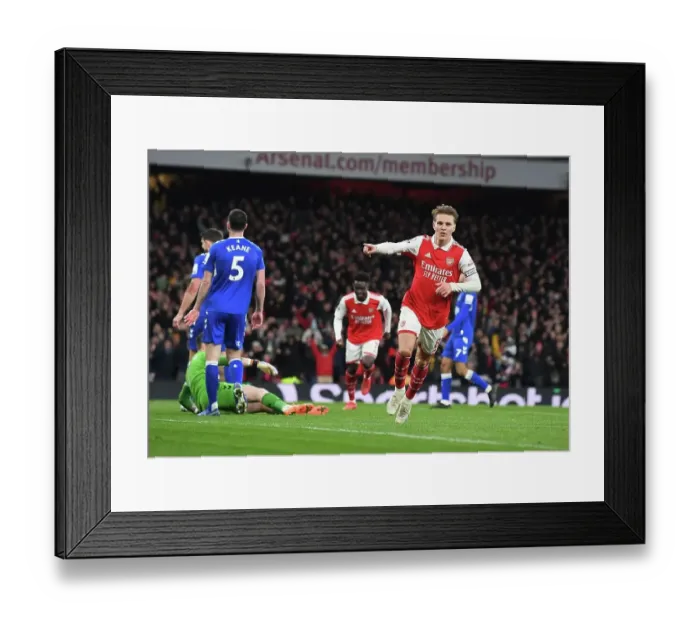 Framed Print : Martin Odegaard's Stunner: Arsenal's Triumphant 3-0 Over Everton in the 2022-23 Premier League