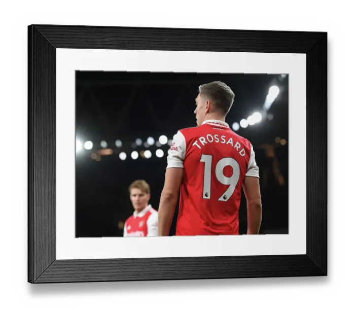Framed Print : Arsenal's Trossard Faces Off Against Everton in Intense Premier League Clash Framed Print : Arsenal's Trossard Faces Off Against Everton in Intense Premier League Clash