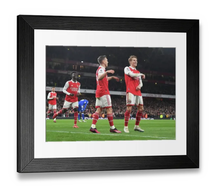 Framed Print : Arsenal's Triumph: Odegaard and Trossard Celebrate Third Goal Against Everton (2022-23) Framed Print : Arsenal's Triumph: Odegaard and Trossard Celebrate Third Goal Against Everton (2022-23)