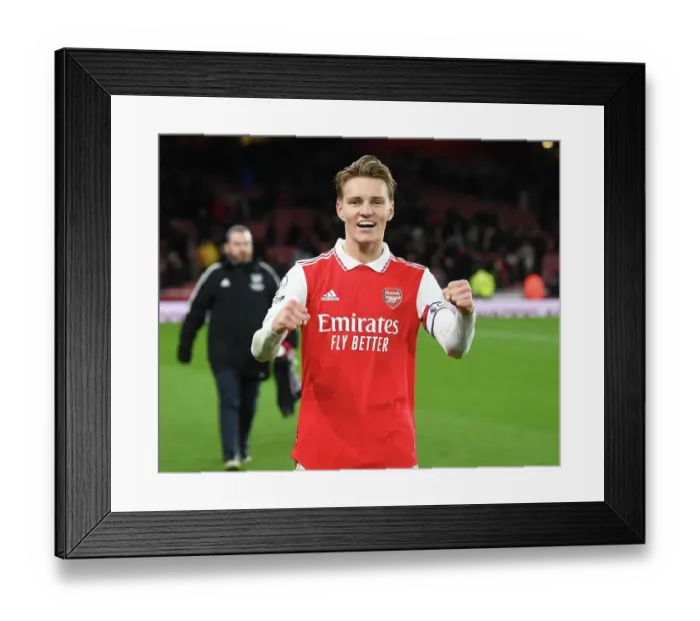 Framed Print : Arsenal's Martin Odegaard Celebrates Victory over Everton in Premier League Showdown Framed Print : Arsenal's Martin Odegaard Celebrates Victory over Everton in Premier League Showdown