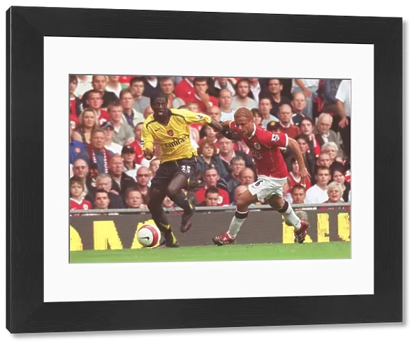 Emmanuel Adebayor (Arsenal) Wes Brown (Manchester United)