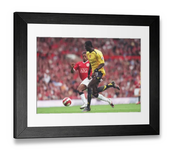 Framed Print : Emmanuel Adebayor (Arsenal) Patrice Evra (Manchester United) Framed Print : Emmanuel Adebayor (Arsenal) Patrice Evra (Manchester United)