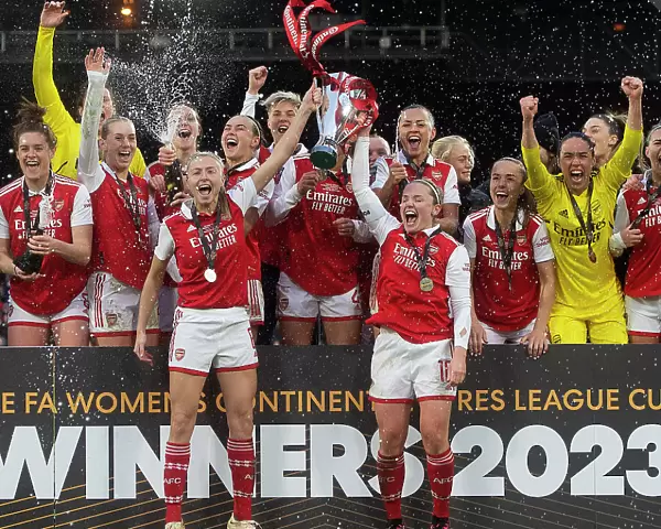 Arsenal Women Celebrate Conti Cup Victory: Leah Williamson and Kim Little Lift the Trophy