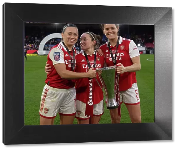 Arsenal Women Celebrate Conti Cup Victory: Katie McCabe, Kim Little, and Jennifer Beattie Hold Alas, Champions!