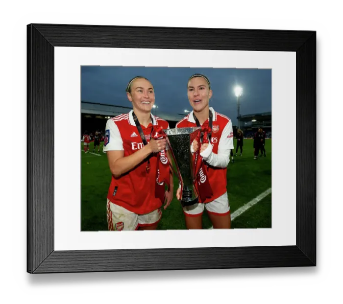 Framed Print : Arsenal Women Celebrate Conti Cup Victory: Steph Catley and Caitlin Foord Hold the Trophy (2023)