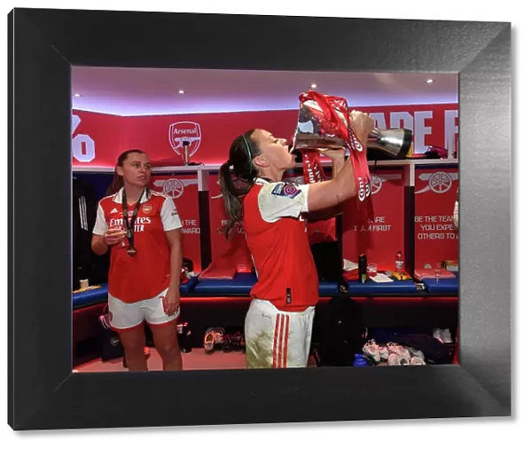 Arsenal Women Celebrate Conti Cup Victory: Katie McCabe Lifts the Trophy After Chelsea Victory