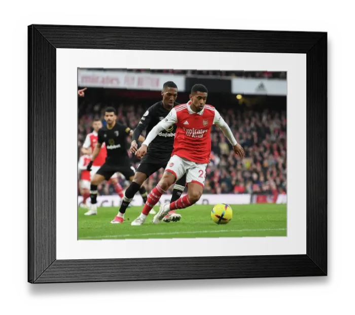 Framed Print : Arsenal's Reiss Nelson Shines in Premier League Clash Against AFC Bournemouth