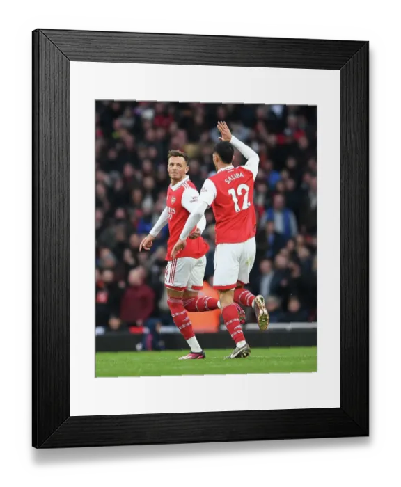 Framed Print : Arsenal's Ben White and William Saliba Celebrate Goals Against AFC Bournemouth in Premier League Clash (2022-23)