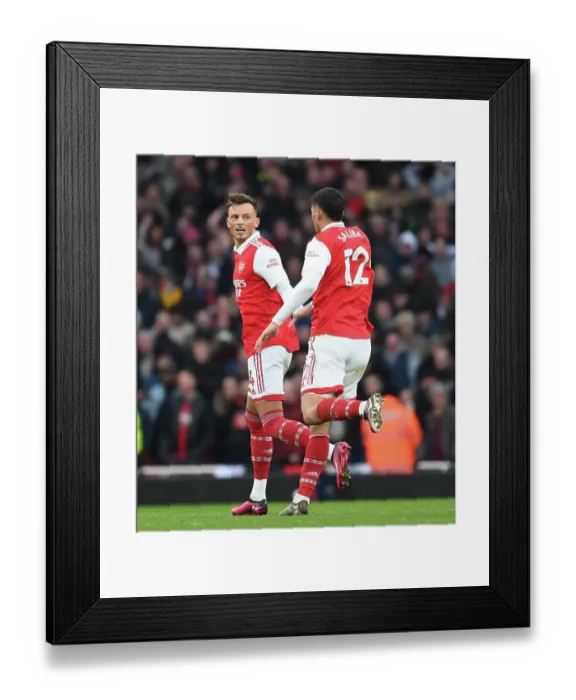 Framed Print : Arsenal's Ben White and William Saliba: Celebrating Goals in Premier League Victory Over AFC Bournemouth (2022-23)