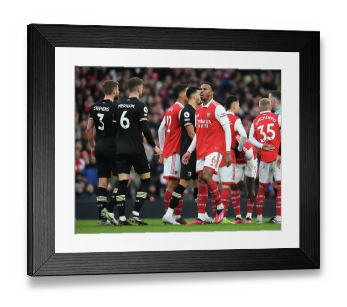 Framed Print : Arsenal vs. AFC Bournemouth: Intense Clash Between Gabriel and Bournemouth Defenders