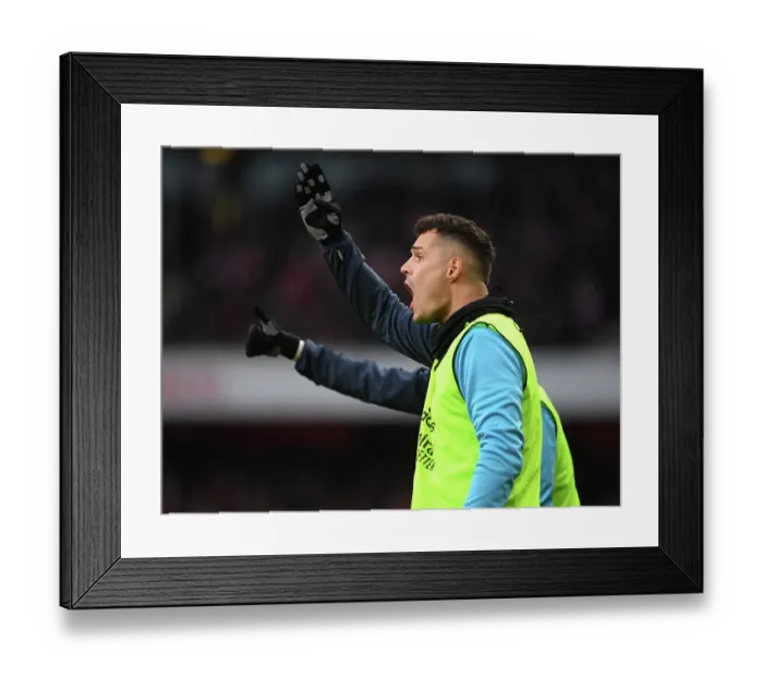 Framed Print : Arsenal's Xhaka Watches from the Sidelines During Arsenal v AFC Bournemouth Premier League Match, 2022-23 Framed Print : Arsenal's Xhaka Watches from the Sidelines During Arsenal v AFC Bournemouth Premier League Match, 2022-23