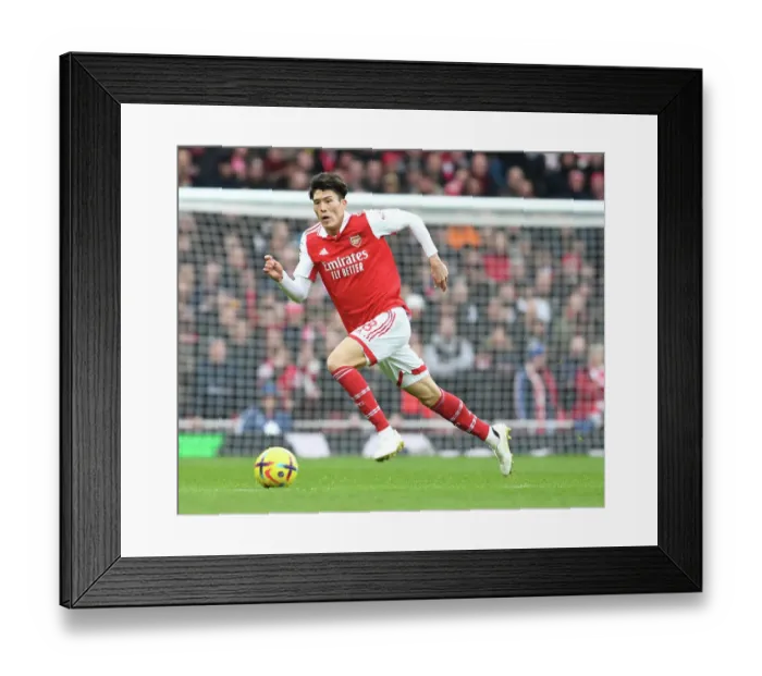 Framed Print : Arsenal's Tomiyasu in Action: Arsenal vs. AFC Bournemouth, Premier League 2022-23