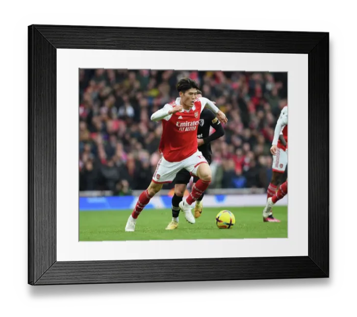 Framed Print : Arsenal's Tomiyasu in Action against AFC Bournemouth, Premier League 2022-23 Framed Print : Arsenal's Tomiyasu in Action against AFC Bournemouth, Premier League 2022-23