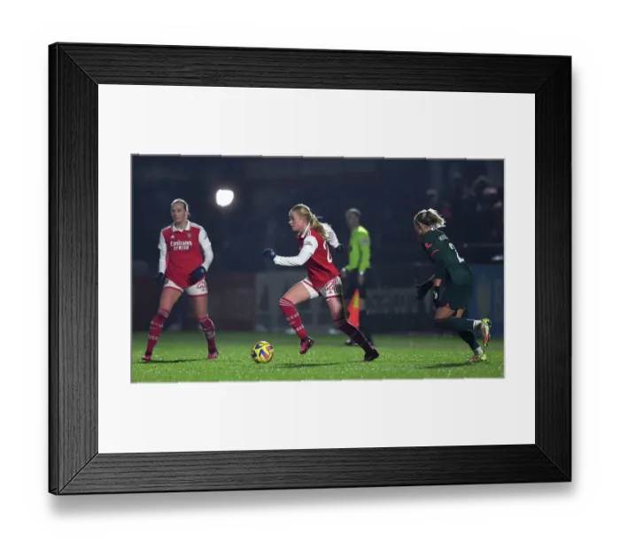 Framed Print : Arsenal's Kathrine Kuhl Faces Off Against Liverpool Women in FA Super League Action (2022-23)