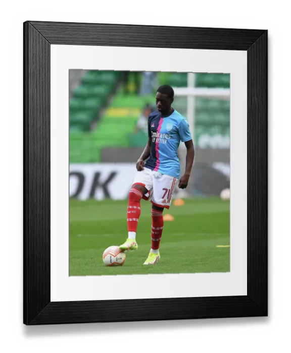 Framed Print : Arsenal's Charles Sagoe Jr Prepares for Europa League Showdown against Sporting CP Framed Print : Arsenal's Charles Sagoe Jr Prepares for Europa League Showdown against Sporting CP