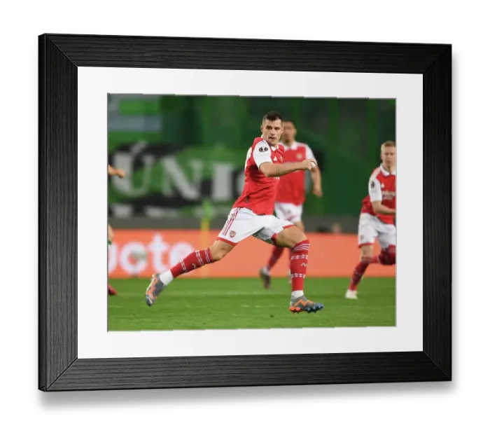 Framed Print : Granit Xhaka in Action: Arsenal's Europa League Battle against Sporting Lisbon, Portugal, 2023