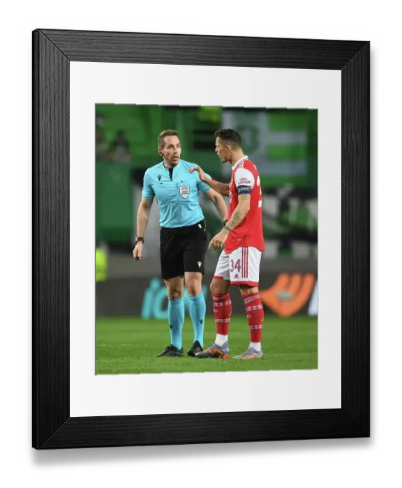 Framed Print : Arsenal's Xhaka Argues with Referee in Sporting Lisbon Showdown - UEFA Europa League 2022-23
