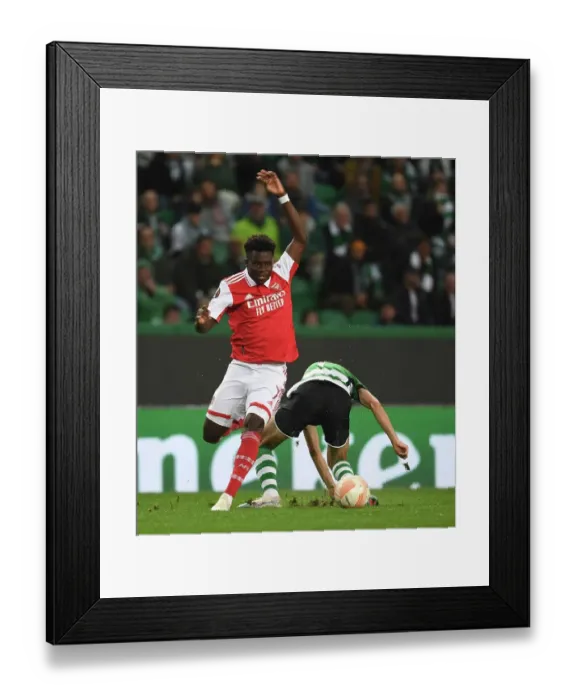 Framed Print : Saka vs. Trincao: A Europa League Showdown - Arsenal's Battle at Sporting Lisbon Framed Print : Saka vs. Trincao: A Europa League Showdown - Arsenal's Battle at Sporting Lisbon