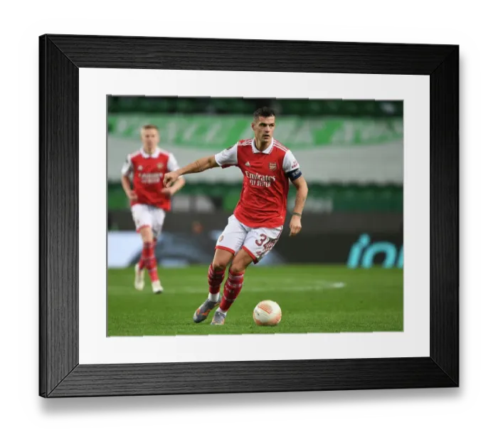 Framed Print : Granit Xhaka: Arsenal's Europa League Battle against Sporting CP (March 2023) Framed Print : Granit Xhaka: Arsenal's Europa League Battle against Sporting CP (March 2023)